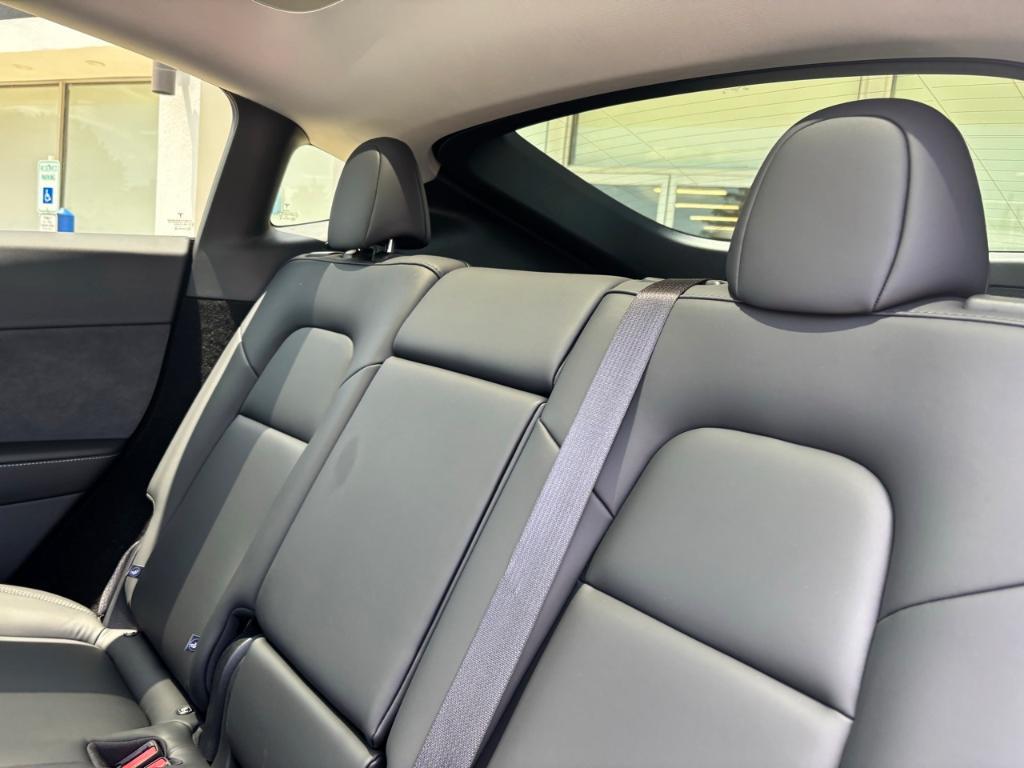 used 2025 Tesla Model Y car, priced at $38,777