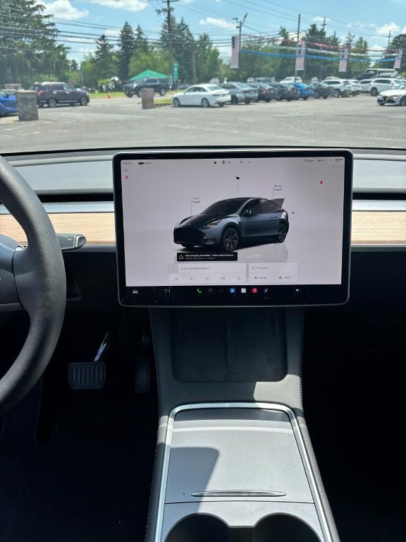 used 2025 Tesla Model Y car, priced at $38,777