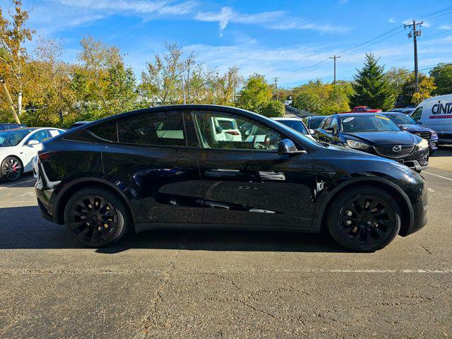 used 2023 Tesla Model Y car, priced at $34,398