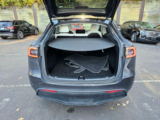 used 2023 Tesla Model Y car, priced at $33,421