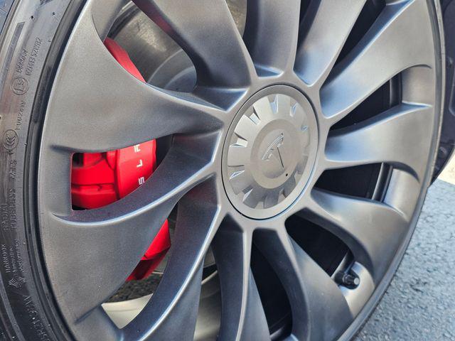 used 2024 Tesla Model Y car, priced at $39,821