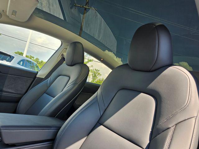 used 2024 Tesla Model Y car, priced at $39,821