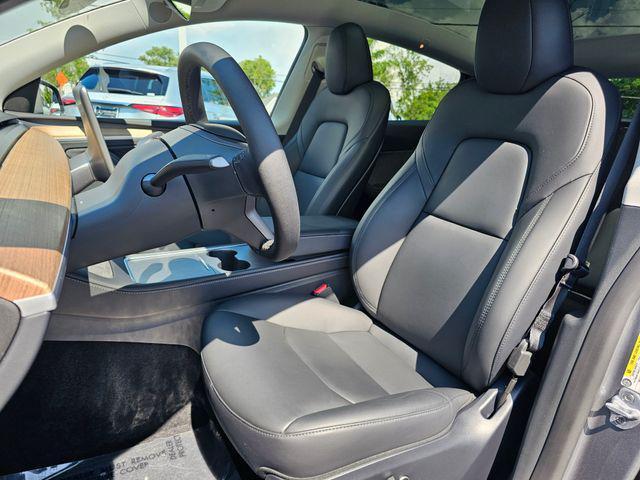 used 2024 Tesla Model Y car, priced at $39,821