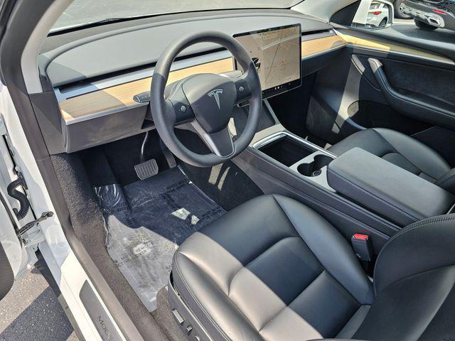 used 2023 Tesla Model Y car, priced at $33,477