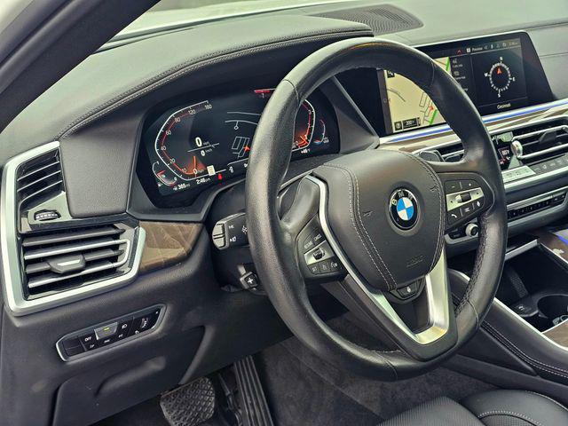 used 2023 BMW X6 car, priced at $43,877