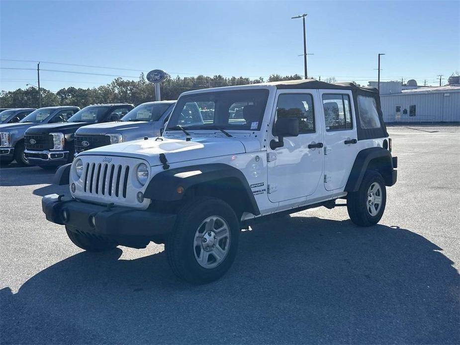 used 2015 Jeep Wrangler Unlimited car, priced at $19,960