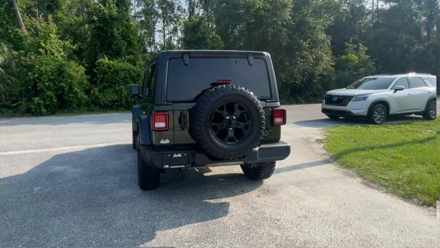 used 2023 Jeep Wrangler car, priced at $30,991