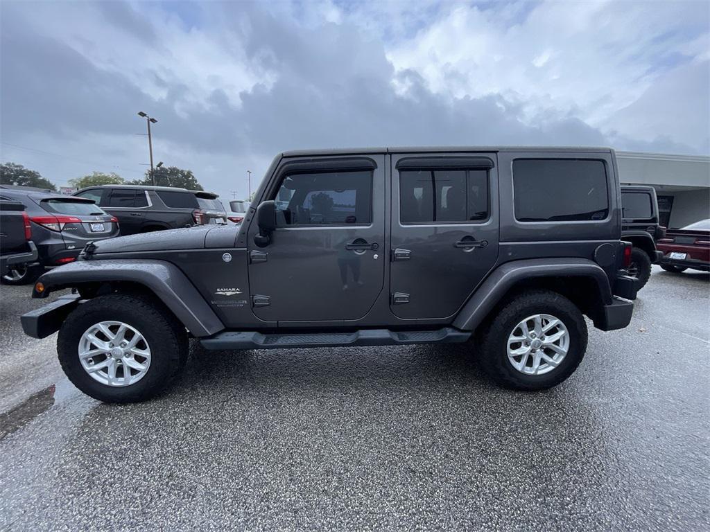 used 2014 Jeep Wrangler Unlimited car, priced at $18,999