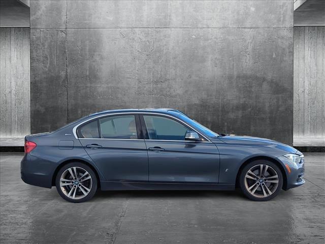 used 2018 BMW 330e car, priced at $17,184