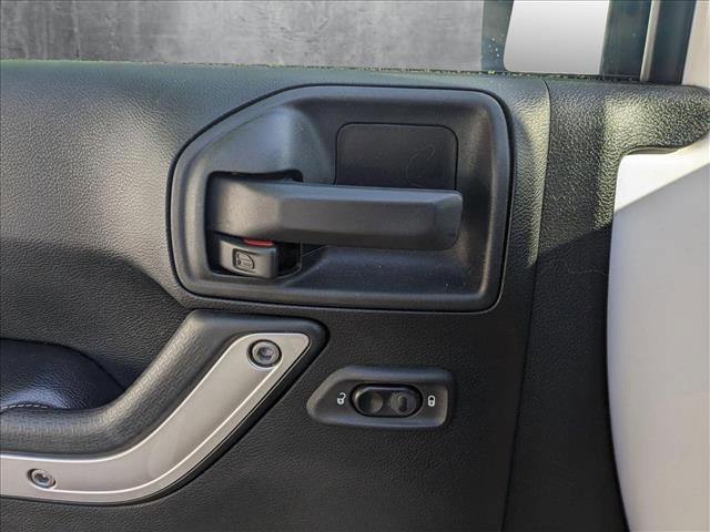 used 2016 Jeep Wrangler Unlimited car, priced at $20,593