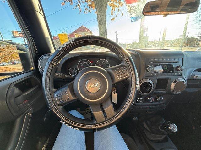 used 2015 Jeep Wrangler car, priced at $19,455