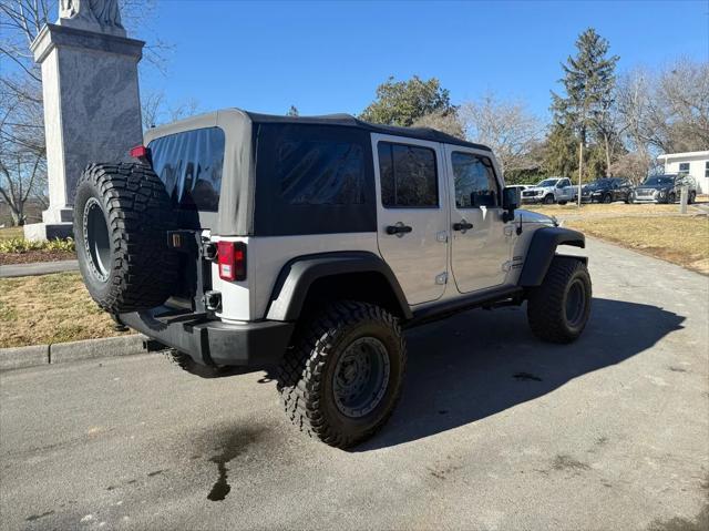 used 2011 Jeep Wrangler Unlimited car, priced at $16,800