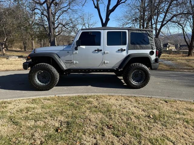 used 2011 Jeep Wrangler Unlimited car, priced at $16,800