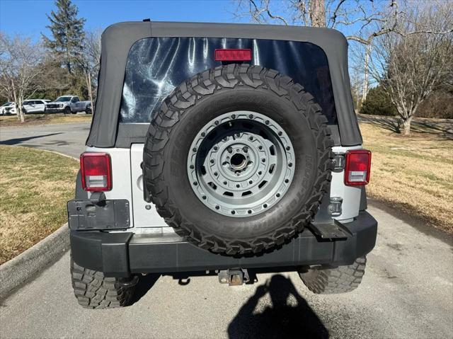 used 2011 Jeep Wrangler Unlimited car, priced at $16,800