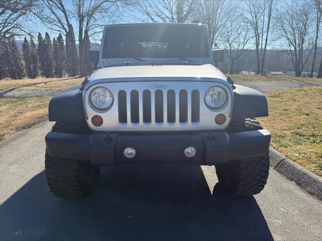 used 2011 Jeep Wrangler Unlimited car, priced at $16,800