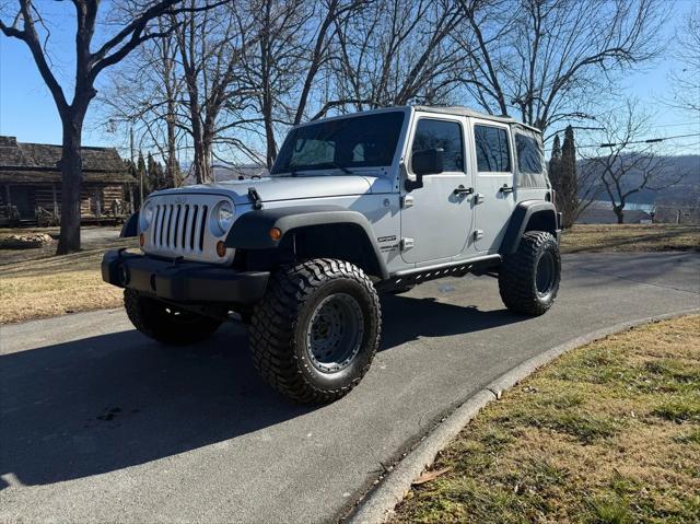 used 2011 Jeep Wrangler Unlimited car, priced at $16,800