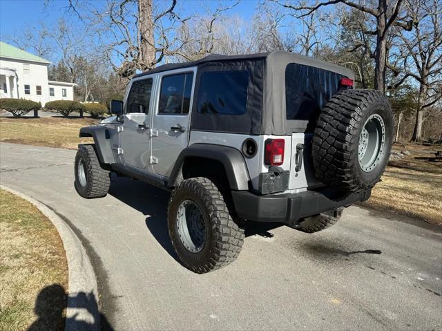 used 2011 Jeep Wrangler Unlimited car, priced at $16,800