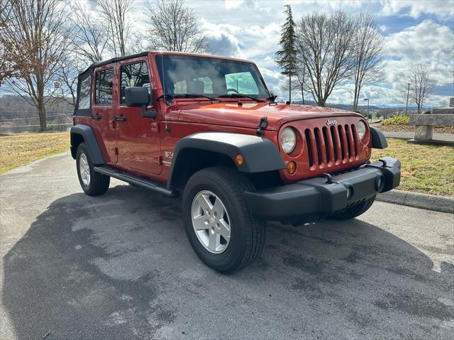 used 2009 Jeep Wrangler Unlimited car, priced at $13,990