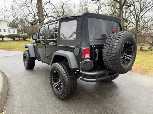 used 2015 Jeep Wrangler Unlimited car, priced at $20,420