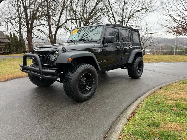 used 2015 Jeep Wrangler Unlimited car, priced at $20,420