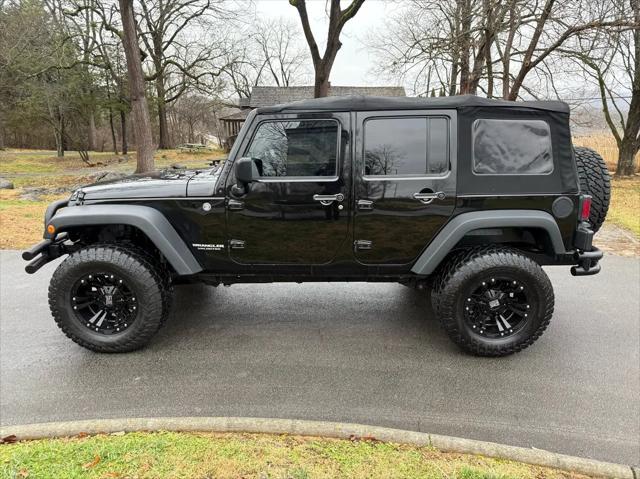 used 2015 Jeep Wrangler Unlimited car, priced at $20,420