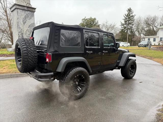 used 2015 Jeep Wrangler Unlimited car, priced at $20,420