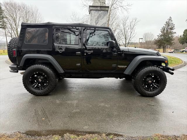 used 2015 Jeep Wrangler Unlimited car, priced at $20,420