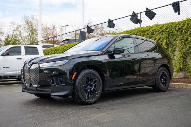 new 2025 BMW iX car, priced at $94,570