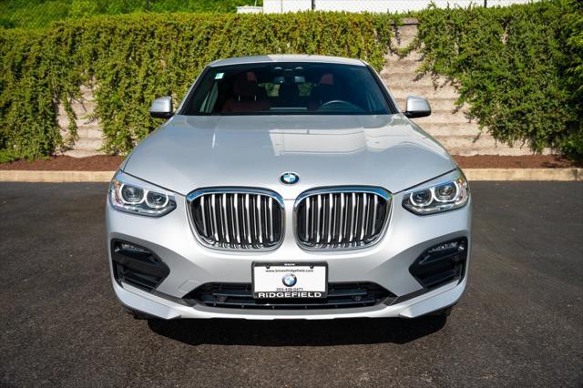 used 2021 BMW X4 car, priced at $37,990