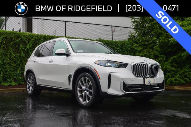 used 2024 BMW X5 car, priced at $63,190