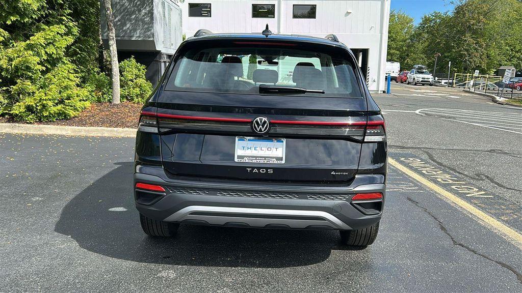 used 2025 Volkswagen Taos car, priced at $24,690
