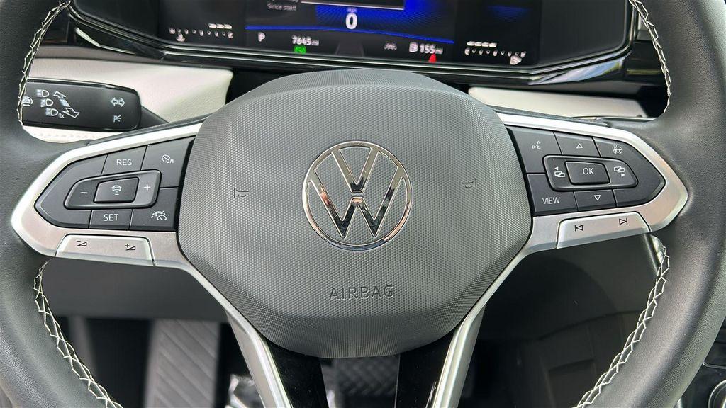 used 2025 Volkswagen Taos car, priced at $24,690