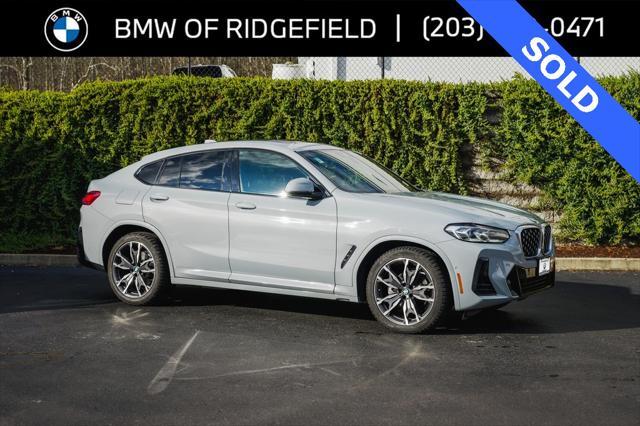 used 2022 BMW X4 car, priced at $40,990