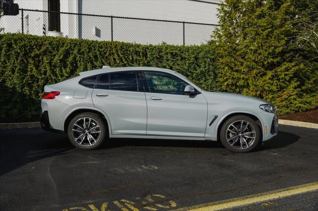 used 2022 BMW X4 car, priced at $40,990