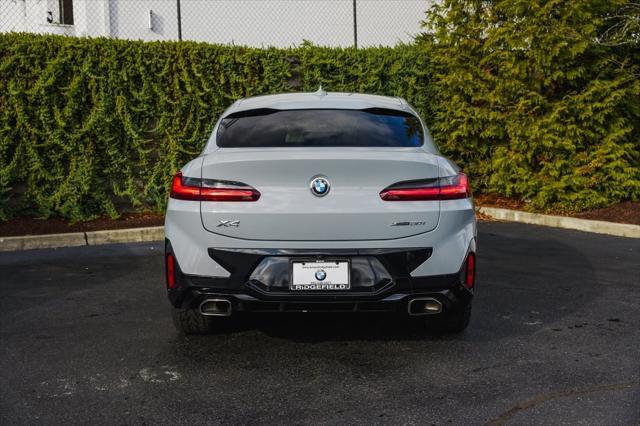 used 2022 BMW X4 car, priced at $40,990