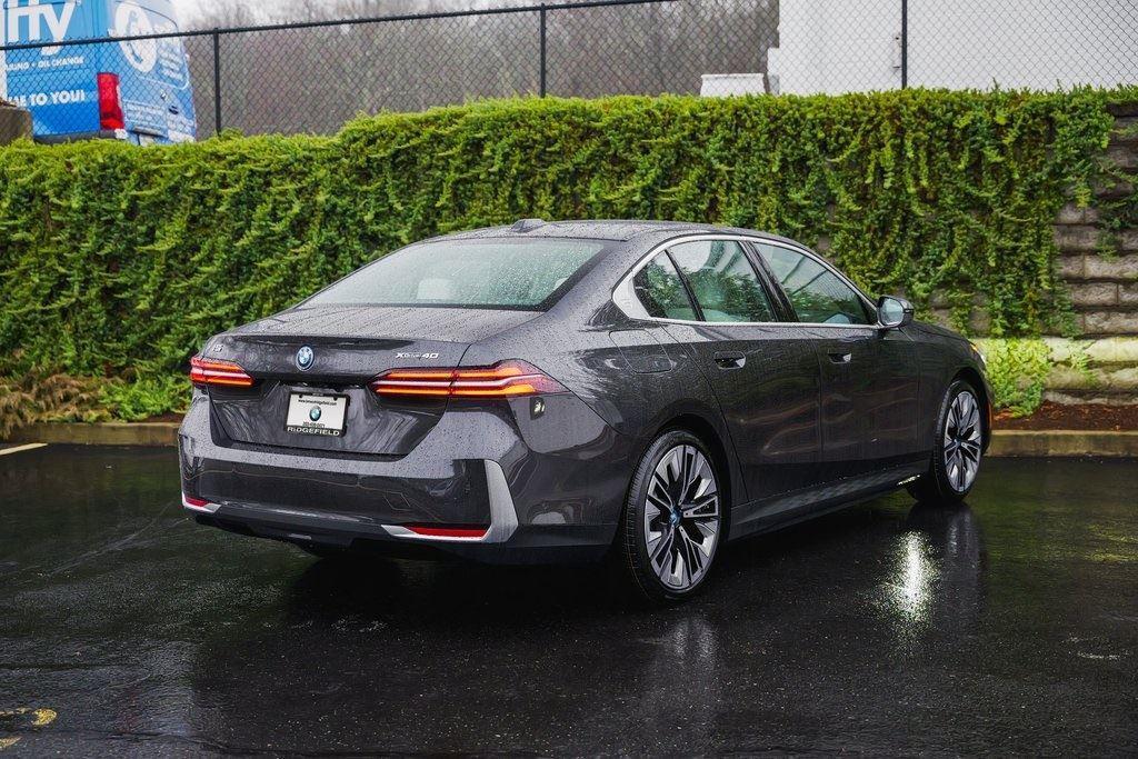 used 2025 BMW i5 car, priced at $65,990