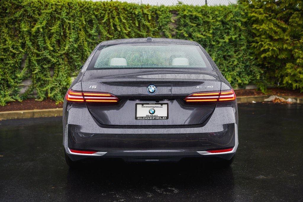 used 2025 BMW i5 car, priced at $65,990