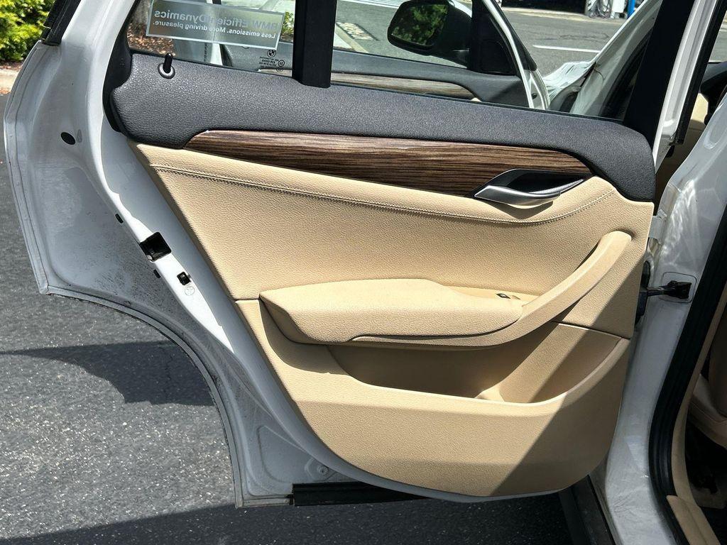 used 2013 BMW X1 car, priced at $12,990