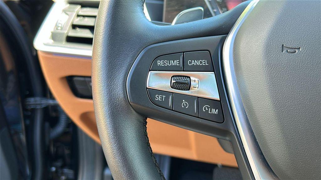 used 2023 BMW 330e car, priced at $36,990
