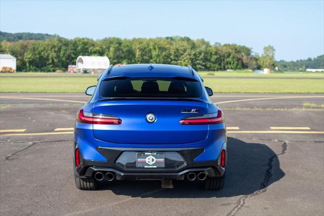 used 2023 BMW X4 M car, priced at $72,990