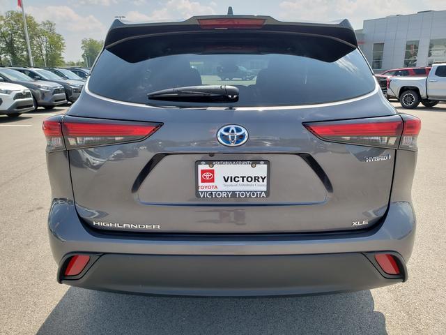 used 2022 Toyota Highlander Hybrid car, priced at $35,155