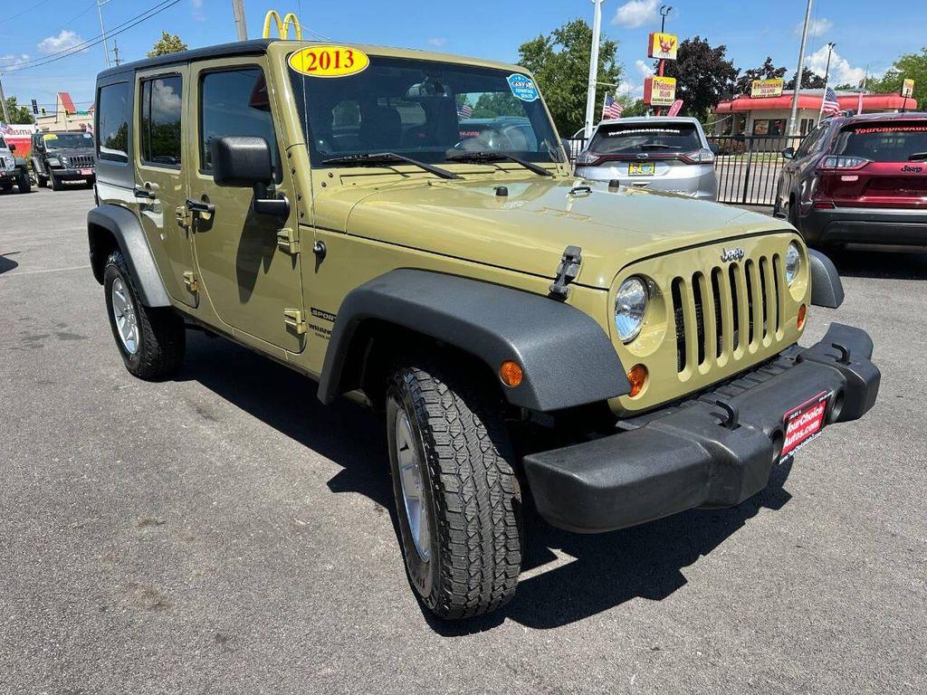 used 2013 Jeep Wrangler Unlimited car, priced at $18,477