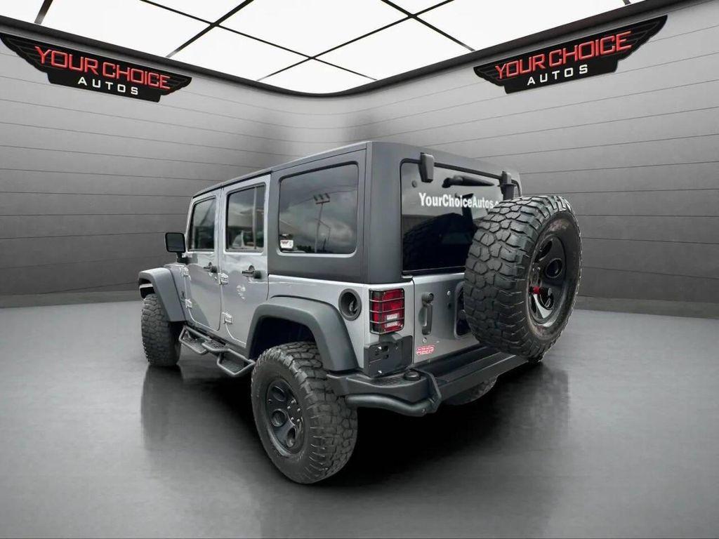 used 2015 Jeep Wrangler Unlimited car, priced at $24,977