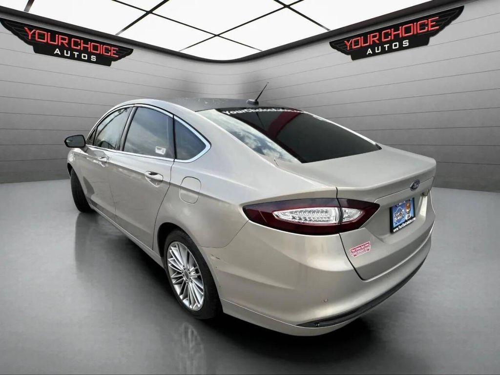 used 2015 Ford Fusion car, priced at $6,977