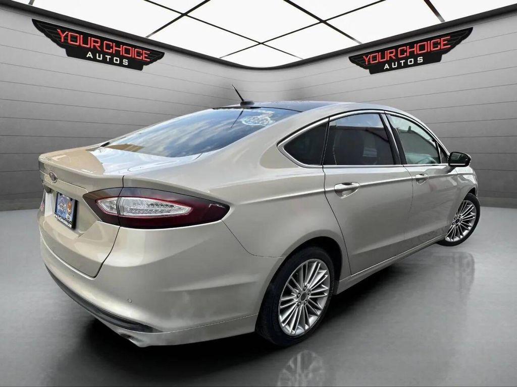 used 2015 Ford Fusion car, priced at $6,977
