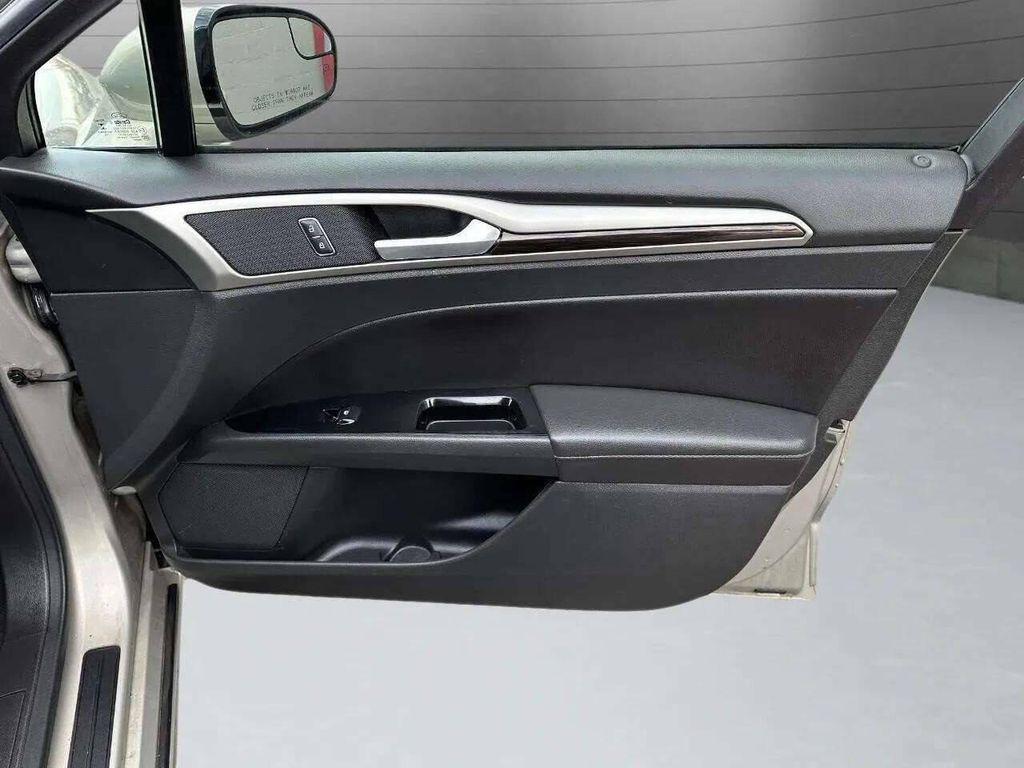 used 2015 Ford Fusion car, priced at $6,977