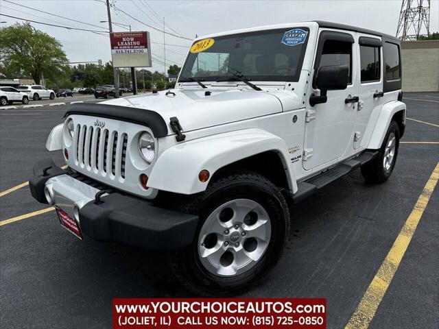 used 2013 Jeep Wrangler Unlimited car, priced at $17,977