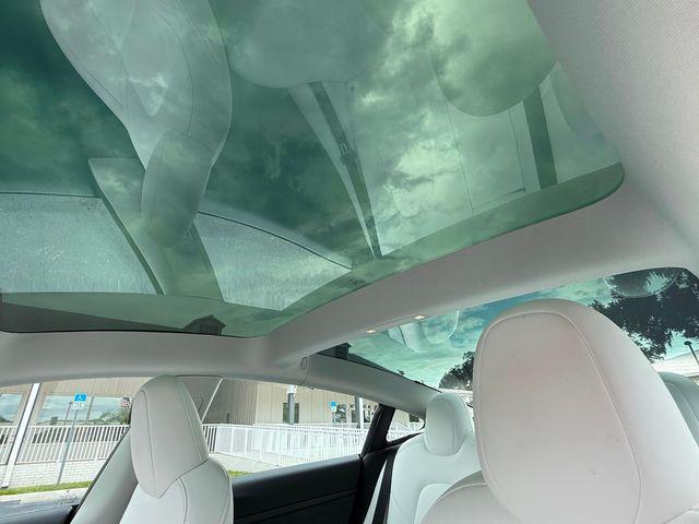 used 2023 Tesla Model 3 car, priced at $29,890