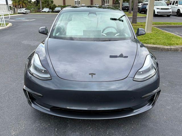 used 2023 Tesla Model 3 car, priced at $29,890