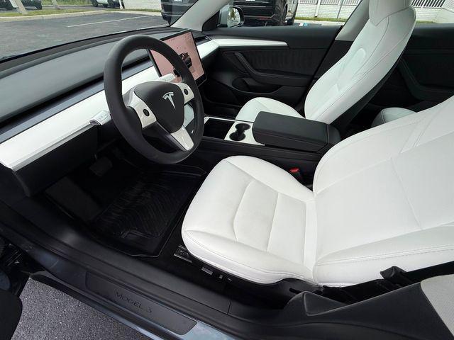 used 2023 Tesla Model 3 car, priced at $29,890